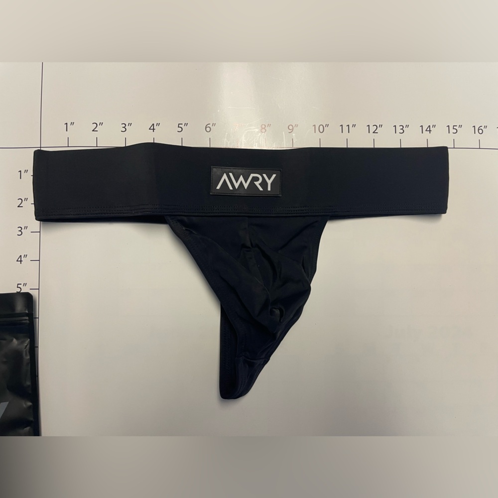 Men’s AWRY swim thong size L,fits like a medium. New